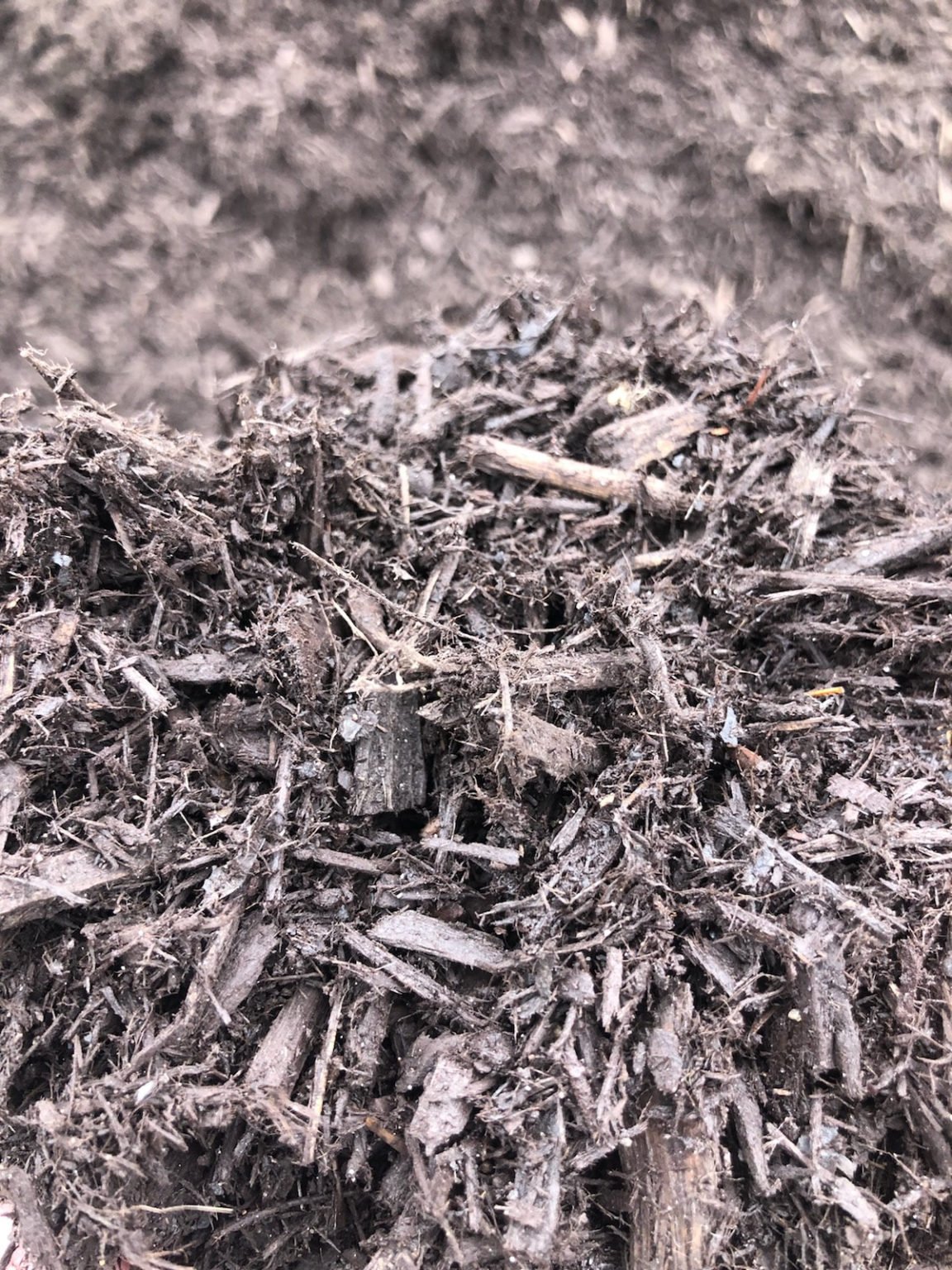 Dark Brown Mulch Sherman Outdoor Services